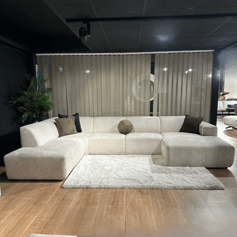 Bankstel Memo van voren gefotografeerd – moderne hoekbank in neutrale stof