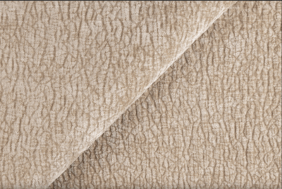 Close-up van beige meubelstof met zachte geweven structuur